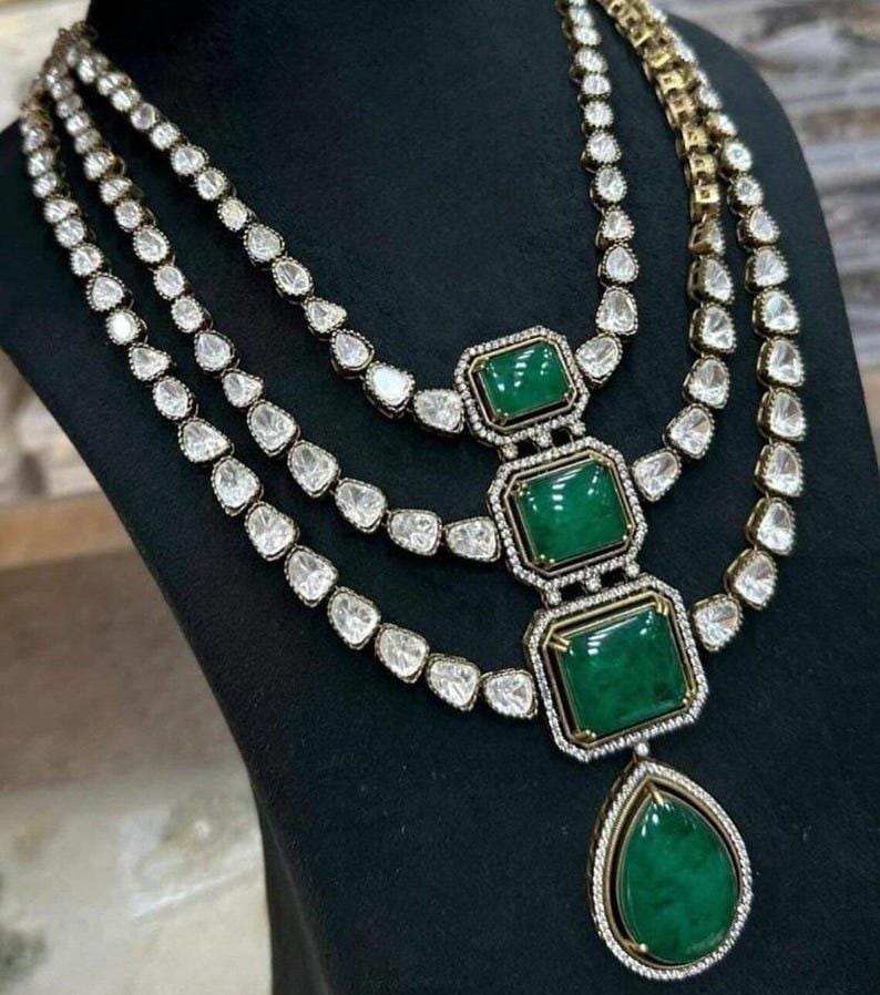 Finest Sabya Inspired Three Layered Long Uncut Moissanite Polki Kundan Emerald Green Doublet Pendant Necklace With Long Chaandbali Earrings