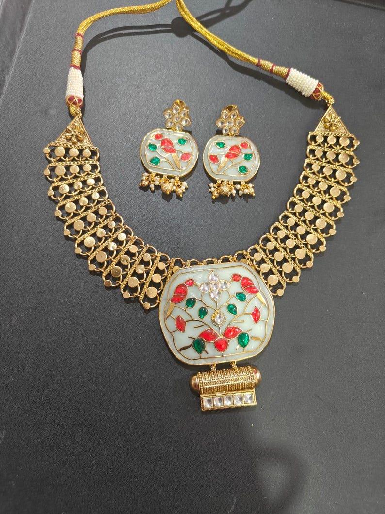 fine Amrapali dull gold fusion necklace set with earrings